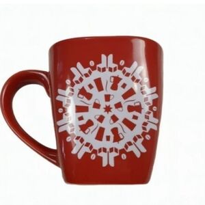 Starbucks red coffee mug with snowflake on it